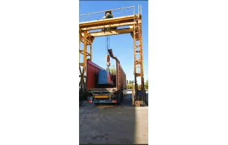 PLACING ON CONTAINER WITH OUR GANTRY